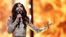 Кончита Вурст на международном конкурсе песни Евровидение-2014. Архивное фото. Кончита Вурст на международном конкурсе песни Евровидение-2014. Архивное фото.