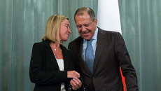 Министр иностранных дел Италии Федерика Могерини и министр иностранных дел России Сергей Лавров. Архивное фото Министр иностранных дел Италии Федерика Могерини и министр иностранных дел России Сергей Лавров. Архивное фото