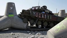 Подбитый украинский танк. Архивное фото Подбитый украинский танк. Архивное фото