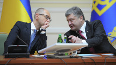 Арсений Яценюк и Петр Порошенко. Архивное фото. Арсений Яценюк и Петр Порошенко. Архивное фото.