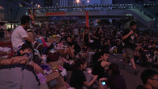 Тысячи протестующих вышли на акцию Occupy Central в Гонконге Тысячи протестующих вышли на акцию Occupy Central в Гонконге