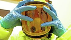Отработка действий на случай поступления больных, инфицированных Эболой. Архивное фото Отработка действий на случай поступления больных, инфицированных Эболой. Архивное фото