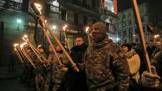 Украинские националисты во время факельного шествия в Киеве. Архивное фото Украинские националисты во время факельного шествия в Киеве. Архивное фото