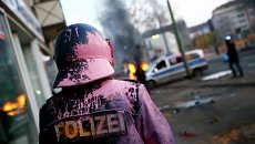Полиция во время беспорядков анти-капиталистического движения Blockupy на улицах Франкфурта-на-Майне Полиция во время беспорядков анти-капиталистического движения Blockupy на улицах Франкфурта-на-Майне