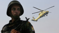 Военнослужащий египетской армии в Каире. Архивное фото Военнослужащий египетской армии в Каире. Архивное фото
