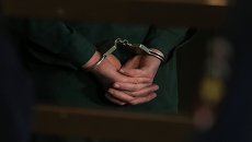Обвиняемый в зале суда. Архивное фото Обвиняемый в зале суда. Архивное фото