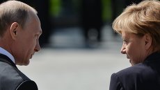 Президент Российской Федерации Владимир Путин и канцлер Федеративной Республики Германия Ангела Меркель. Архивное фото Президент Российской Федерации Владимир Путин и канцлер Федеративной Республики Германия Ангела Меркель. Архивное фото