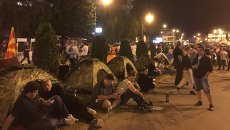 Участники акции протеста в центре Скопье. Архивное фото Участники акции протеста в центре Скопье. Архивное фото
