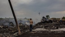 На месте крушения малайзийского самолета Boeing 777 в районе города Шахтерск Донецкой области На месте крушения малайзийского самолета Boeing 777 в районе города Шахтерск Донецкой области