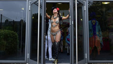 Участницы парада Notting Hill Carnival в западном Лондоне. Август 2015 Участницы парада Notting Hill Carnival в западном Лондоне. Август 2015