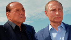 Владимир Путин и Сильвио Берлускони. Архивное фото Владимир Путин и Сильвио Берлускони. Архивное фото
