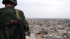 Военнослужащий сирийской армии. Архивное фото Военнослужащий сирийской армии. Архивное фото