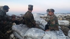 Военнослужащие сирийской армии в провинции Латакия, архивное фото Военнослужащие сирийской армии в провинции Латакия, архивное фото