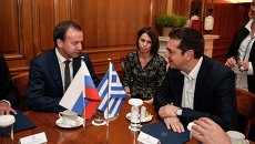 Встреча вице-премьера РФ Аркадия Дворковича с премьер-министром Греции Алексисом Ципрасом. Архивное фото Встреча вице-премьера РФ Аркадия Дворковича с премьер-министром Греции Алексисом Ципрасом. Архивное фото