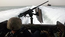 На борту Riverine Command Boat американских ВМС. Архивное фото На борту Riverine Command Boat американских ВМС. Архивное фото