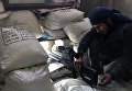 Боец Сирийской арабской армии на огневой позиции в ходе боевых действий против отрядов террористов в пригороде Дамаска Дарайе Боец Сирийской арабской армии на огневой позиции в ходе боевых действий против отрядов террористов в пригороде Дамаска Дарайе