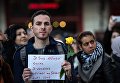 Участник траурного митинга в память о погибших в результате взрывов в аэропорту Завентем и в районе станции метро Мальбек в Брюсселе Участник траурного митинга в память о погибших в результате взрывов в аэропорту Завентем и в районе станции метро Мальбек в Брюсселе
