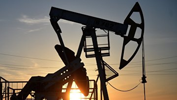 Цены на нефть слабо растут на фоне данных API и дешевеющем долларе