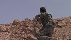 Наступление курдов на позиции боевиков ИГ в сирийском городе Манбидж Наступление курдов на позиции боевиков ИГ в сирийском городе Манбидж