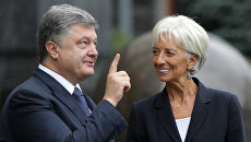 Президент Украины Петр Порошенко и директор-распорядитель МВФ Кристин Лагард. Февраль 2016 года Президент Украины Петр Порошенко и директор-распорядитель МВФ Кристин Лагард. Февраль 2016 года