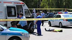 Последствия перестрелки возле отделения полиции в Алма-Ате Последствия перестрелки возле отделения полиции в Алма-Ате