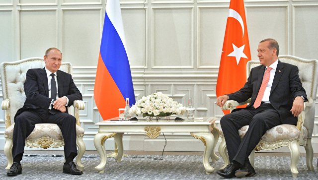 Президент России Владимир Путин и президент Турции Реджеп Тайип Эрдоган во время встречи в Баку. 13 июня 2015 года