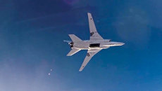 Дальний бомбардировщик ВКС РФ Ту-22М3 во время нанесения бомбовых авиаударов по объектам ИГ в провинциях Алеппо, Дейр-эз-Зор и Идлиб в Сирии Дальний бомбардировщик ВКС РФ Ту-22М3 во время нанесения бомбовых авиаударов по объектам ИГ в провинциях Алеппо, Дейр-эз-Зор и Идлиб в Сирии