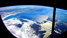 Вид земли из космоса глазами космонавта Роскосмоса Юрия Маленченко. Архивное фото Вид земли из космоса глазами космонавта Роскосмоса Юрия Маленченко. Архивное фото