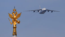 Тяжёлый дальний транспортный самолёт АН-124-100 Руслан во время военного парада в ознаменование 70-летия Победы в Великой Отечественной войне 1941-1945 годов Тяжёлый дальний транспортный самолёт АН-124-100 Руслан во время военного парада в ознаменование 70-летия Победы в Великой Отечественной войне 1941-1945 годов