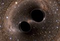Кадр моделирования столкновения двух черных дыр в космосе