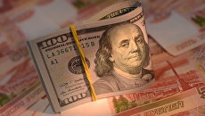 Денежные купюры России и США. Архивное фото Денежные купюры России и США. Архивное фото