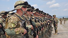 Военнослужащие Грузинской армии во время совместных учений НАТО в Тбилиси, Грузия. Архивное фото Военнослужащие Грузинской армии во время совместных учений НАТО в Тбилиси, Грузия. Архивное фото
