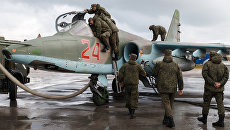 Подготовка к вылету самолетов ВКС России на авиабазе Хмеймим в Сирии. Архивное фото Подготовка к вылету самолетов ВКС России на авиабазе Хмеймим в Сирии. Архивное фото
