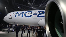 Выкатка нового пассажирского самолета МС-21 в Иркутске. Архивное фото Выкатка нового пассажирского самолета МС-21 в Иркутске. Архивное фото