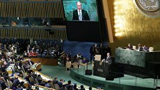 Президент России Владимир Путин выступает на пленарном заседании 70-й сессии Генеральной Ассамблеи ООН в Нью-Йорке. 28 сентября 2015. Архивное фото Президент России Владимир Путин выступает на пленарном заседании 70-й сессии Генеральной Ассамблеи ООН в Нью-Йорке. 28 сентября 2015. Архивное фото