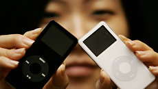 Плеер iPod nano первого поколения. Архивное фото Плеер iPod nano первого поколения. Архивное фото