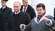 Президент РФ Владимир Путин и губернатор Владимирской области Светлана Орлова. Архивное фото Президент РФ Владимир Путин и губернатор Владимирской области Светлана Орлова. Архивное фото