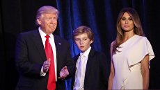 Дональд Трамп, сын Баррон и жена Мелания Дональд Трамп, сын Баррон и жена Мелания