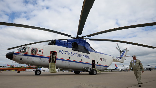 Вертолет Ми-26Т эвакуировал аварийный самолет Ан-2 со льда Северной Двины