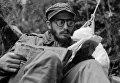 Фидель Кастро во время чтения. 1 января 1957 Фидель Кастро во время чтения. 1 января 1957