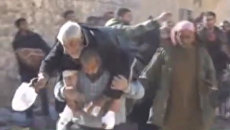 Мирные жители покидали один из районов Алеппо под пулями боевиков Мирные жители покидали один из районов Алеппо под пулями боевиков