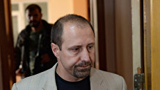 Командир батальона Восток Александр Ходаковский перед началом заседания Трехсторонней контактной группы в Донецке Командир батальона Восток Александр Ходаковский перед началом заседания Трехсторонней контактной группы в Донецке
