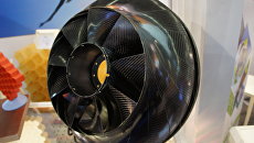 Engine fan with carbon-fiber casing