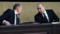 Президент РФ Владимир Путин и директор Федеральной службы безопасности Александр Бортников. Архивное фото Президент РФ Владимир Путин и директор Федеральной службы безопасности Александр Бортников. Архивное фото