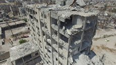 Разрушенные здания в квартале Бани-Зейд на севере Алеппо Разрушенные здания в квартале Бани-Зейд на севере Алеппо