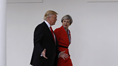 Президент США Дональд Трамп и премьер-министр Великобритании Тереза Мэй. Архивное фото Президент США Дональд Трамп и премьер-министр Великобритании Тереза Мэй. Архивное фото