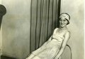 Мисс Рита Пишель, американская танцовщица, упражняется на электрическом тренажёре в гимнастическом зале, который открыла Маржори Рорк в Нью-Йорке Мисс Рита Пишель, американская танцовщица, упражняется на электрическом тренажёре в гимнастическом зале, который открыла Маржори Рорк в Нью-Йорке