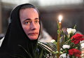 Верующая во время патриаршего служения в канун Вербного воскресенья в храме Христа Спасителя Верующая во время патриаршего служения в канун Вербного воскресенья в храме Христа Спасителя