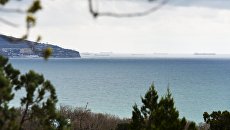 Вид на море в городе Геленджик. Архивное фото Вид на море в городе Геленджик. Архивное фото