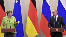 Президент РФ Владимир Путин и федеральный канцлер ФРГ Ангела Меркель во время совместной пресс-конференции в Сочи. 2 мая 2017 Президент РФ Владимир Путин и федеральный канцлер ФРГ Ангела Меркель во время совместной пресс-конференции в Сочи. 2 мая 2017